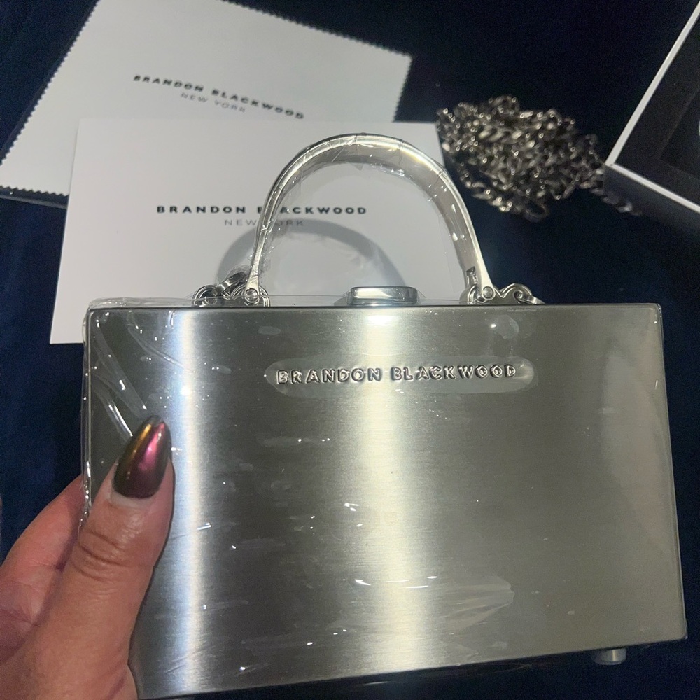 Brandon Blackwood-SLIM metal trunk